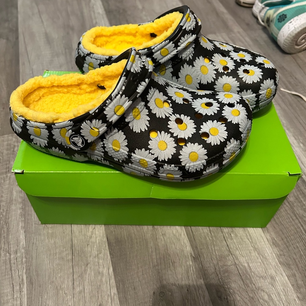 Brand new with box (box has writing on it) sunflower fuzzy crocs woman’s size 6